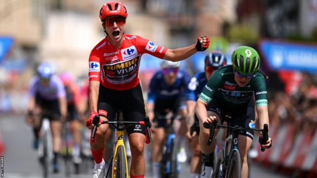 Dutch rider Marianne Vos won stage three of La Vuelta Femenina to strengthen her hold on the red jersey