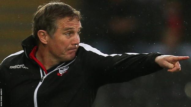 Phil Parkinson guides his players