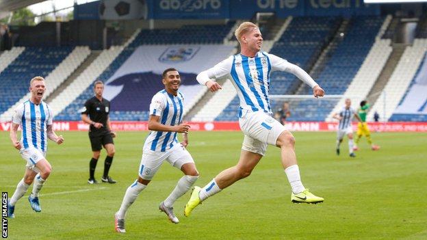 Emile Smith Rowe celebrates scoring for Huddersfield against West Brom