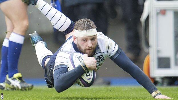 Finn Russell bursts through to score Scotland's first try
