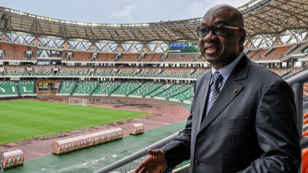 Idriss Diallo, president of the Ivorian football federation, speaks in the stands of the Alassane Ouattara Olympic Stadium