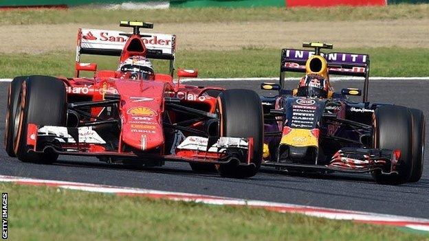 Ferrari driver Kimi Raikkonen leads Red Bull driver Daniil Kvyat