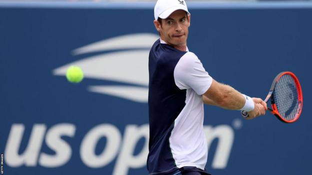 Andy Murray hits a return against Corentin Moutet at the US Open