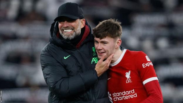 Liverpool manager Jurgen Klopp embraces Conor Bradley after the Europa League win over LASK at Anfield in November