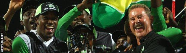 Allen Stanford with Chris Gayle (left)