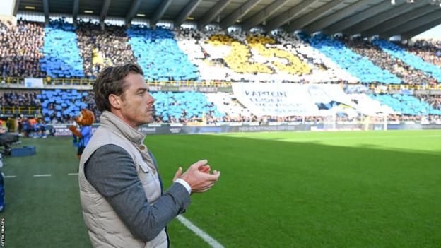 BRUGGE, BELGIUM - OCTOBER 27 : Young Club Brugge fans joking with