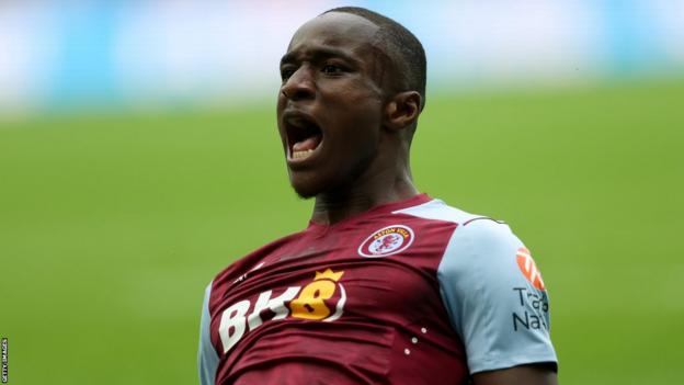 Moussa Diaby celebrates scoring on his competitive debut for Aston Villa