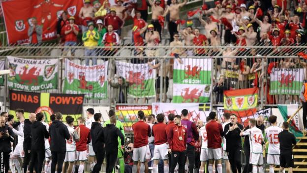 Wales v Croatia - Wales players celebrate with Wales fans