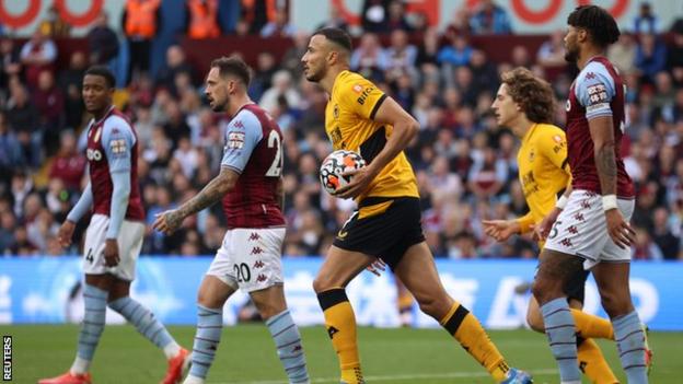 Wolves' Romain Saiss celebrates scoring for Wolves against Aston Villa