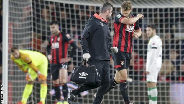 Bournemouth captain Simon Francis going off injured