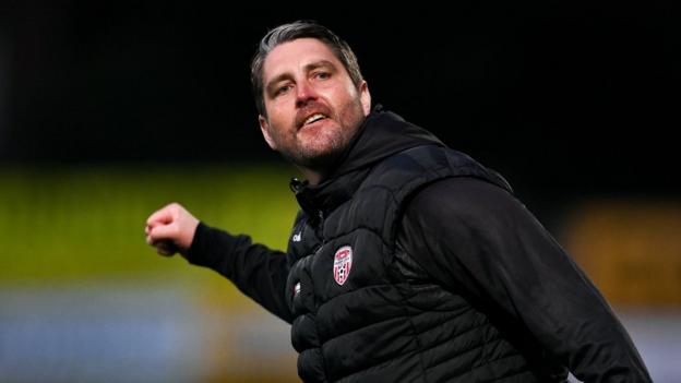 Joy for Derry manager Ruaidhrí Higgins after the final whistle at the Brandywell