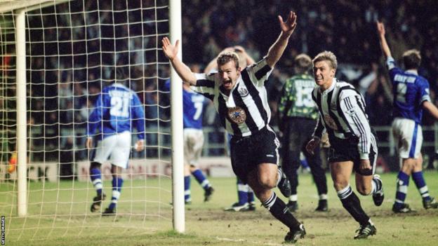 Alan Shearer celebrates scoring for Newcastle against Leicester