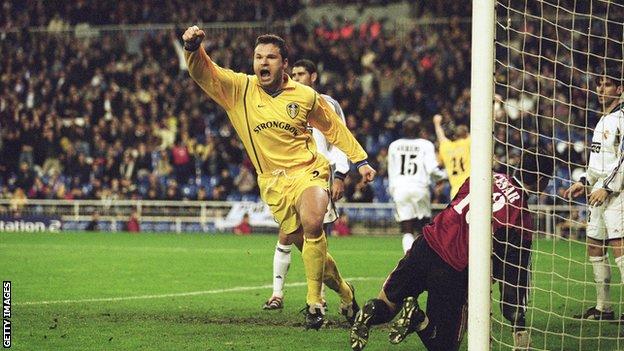 Mark Viduka celebrates scoring against Real Madrid