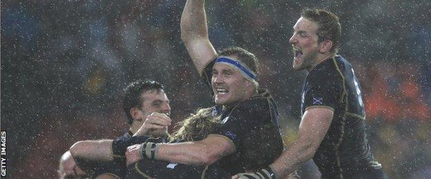 John Barclay (right) celebrates with Scotland team-mates after their win in Australia in 2012