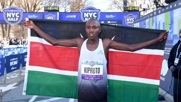 Rhonex Kipruto celebrates triumph  astatine  the 2022 New York City Half Marathon