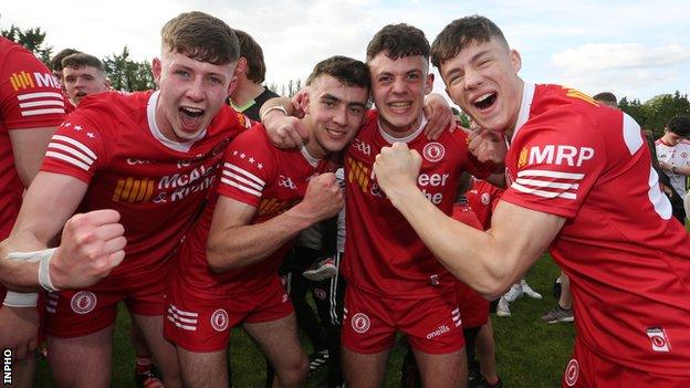 Tyrone players celebrate