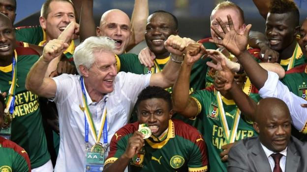 Belgian coach Hugo Broos celebrates with his Cameroon players