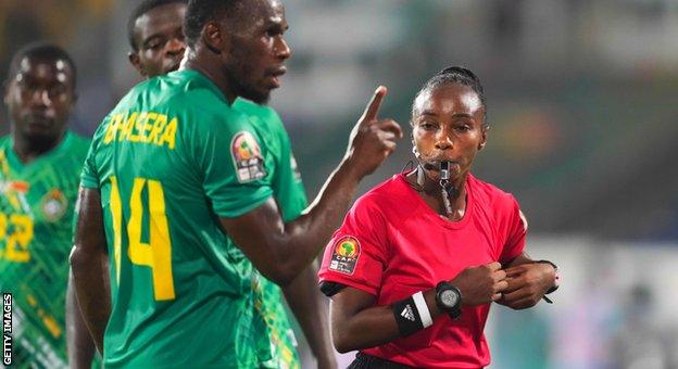 Salima Mukansanga (right) officiating at the 2021 Africa Cup of Nations