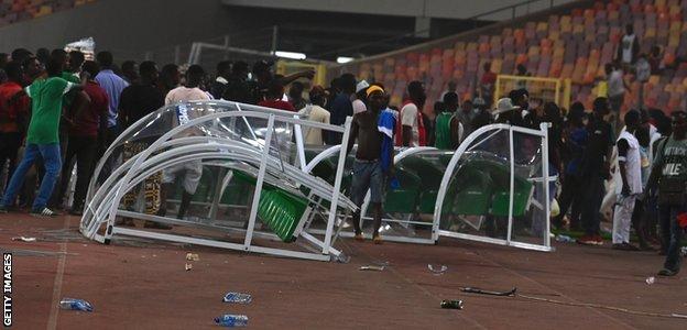 Damage to dugouts at the Moshood Abiola National Stadium in Abuja after a game between Nigeria and Ghana in March