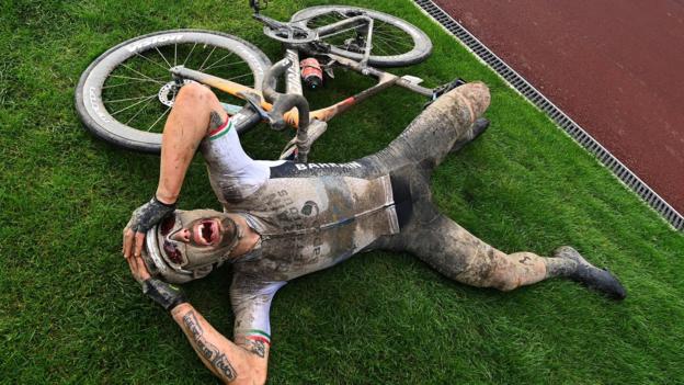 3 October: Mud-covered cyclist Sonny Colbrelli of Italy celebrates winning the 118th Paris-Roubaix