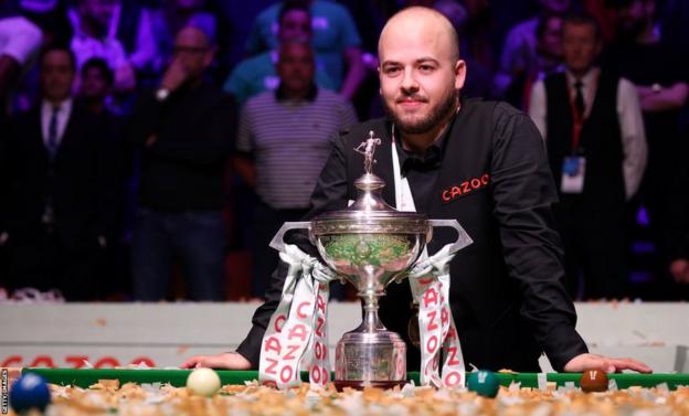 Luca Brecel with the World Championship Trophy