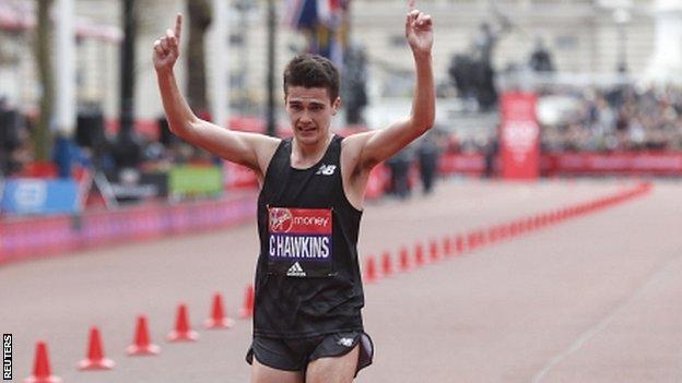 Callum Hawkins crosses the finish line at the London Marathon