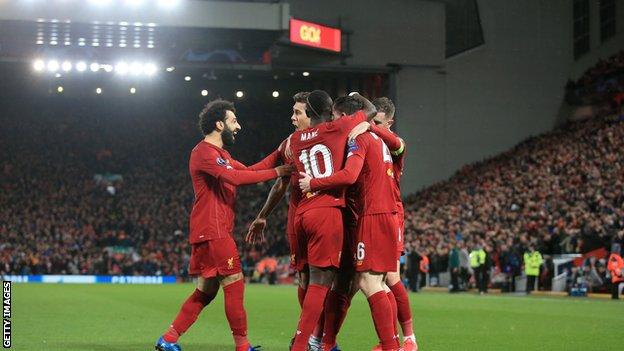 League leaders Liverpool celebrate a goal