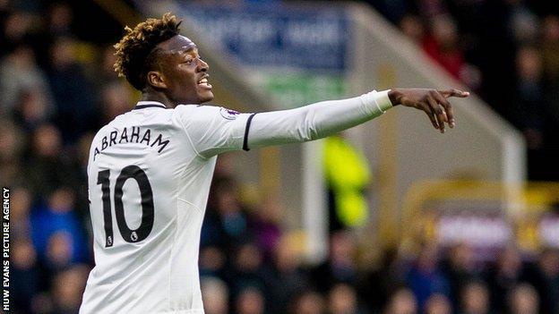 Tammy Abraham points and shouts instructions to a team-mate