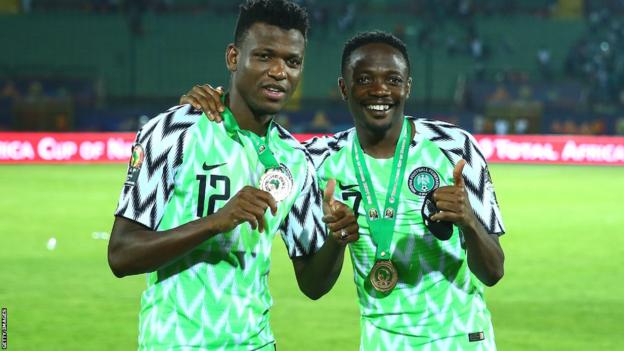 Shehu Abdullahi and Ahmed Musa pose with their bronze medals at the 2019 Africa Cup of Nations