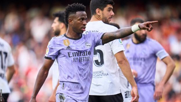 Vinicius Jr reacts after receiving racist abuse during Real Madrid's match at Valencia on Sunday