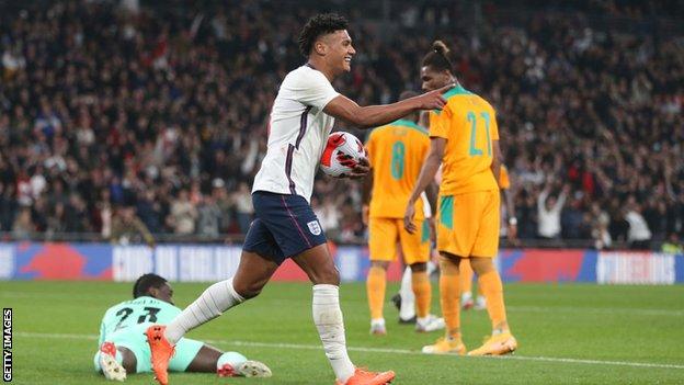 Ollie Watkins celebrates after scoring for England in a 3-0 friendly win over Ivory Coast in March 2022