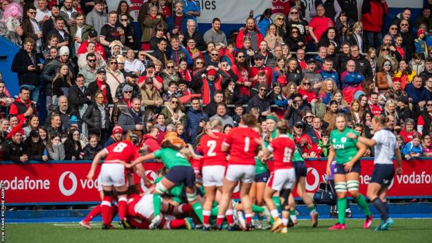 A full Cardiff Arms Park stand watches Wales and Ireland in action