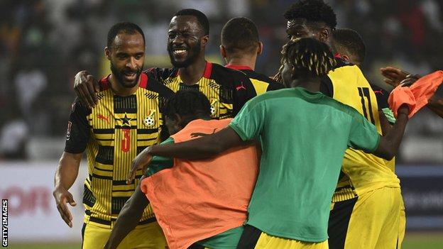 Ghana players celebrate qualification for the World Cup