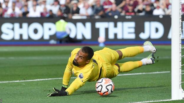 Chelsea goalkeeper Robert Sanchez makes a save during his side's game against West Ham in August