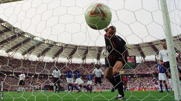 David Seaman is beaten by Ronaldinho's lob for Brazil