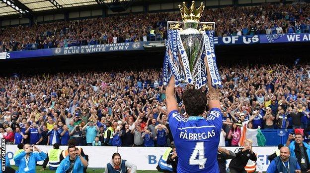 Cesc Fabregas celebrates after winning the 2015 Premier League title