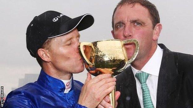 Winning jockey Kerrin McEvoy and trainer Charlie Appleby after Cross Counter's Melbourne Cup win