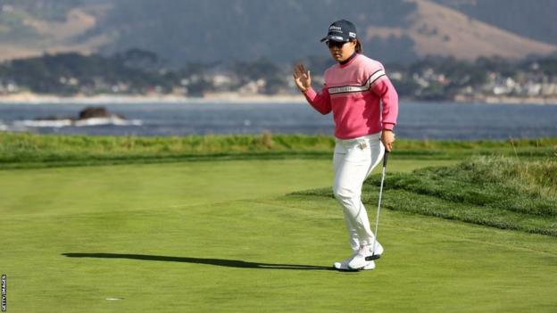 Japan's Nasa Hataoka salutes the crowd after shooting a six-under-par 66 to take the outright lead after the third round of the US Women's Open at Pebble Beach