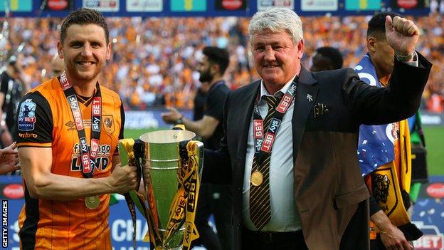 Alex Bruce and Steve Bruce celebrate winning the Championship play-off final against Sheffield Wednesday in 2016