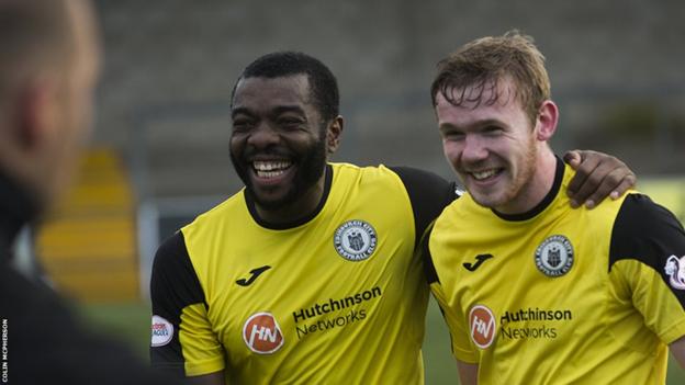 Captain Joe Mbu (left) celebrates with Lewis Allan at the final whistle as City secure three points at Station Park