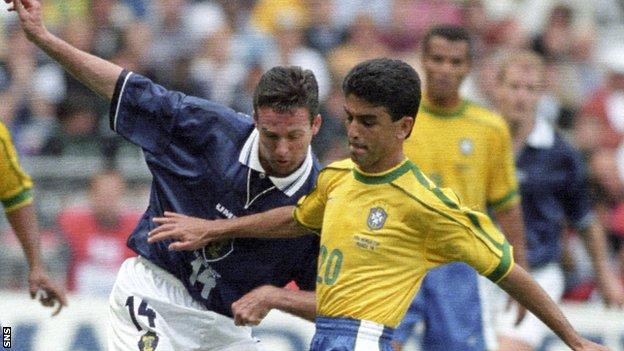 Paul Lambert contest the ball with Brazil forward Bebeto at the 1998 World Cup