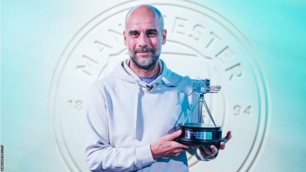 Pep Guardiola with his Coach of the Year award