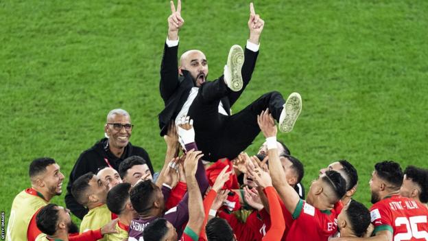 Walid Regragui thrown in the air after Morocco beat Spain