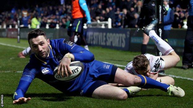 Winger Barry Daly beats the attempted tackle of Andrew Trimble to score Leinster's second try