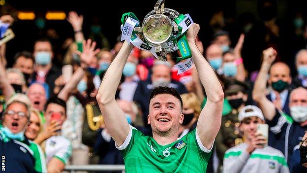 Limerick captain Declan Hannon raises the Liam McCarthy Cup after victory over Cork