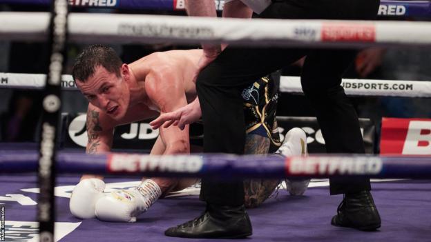 Josh Warrington on the canvas