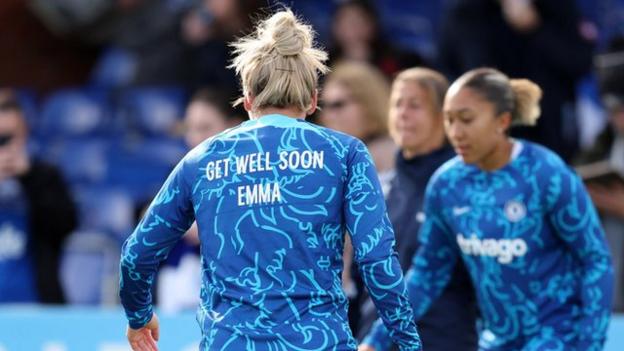Chelsea's players warmed-up in tops with the message 'Get Well Soon Emma' on the back of them