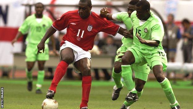 Nigeria's Justice Cristopher (right) battles with England's Emile Heskey at the 2002 World Cup