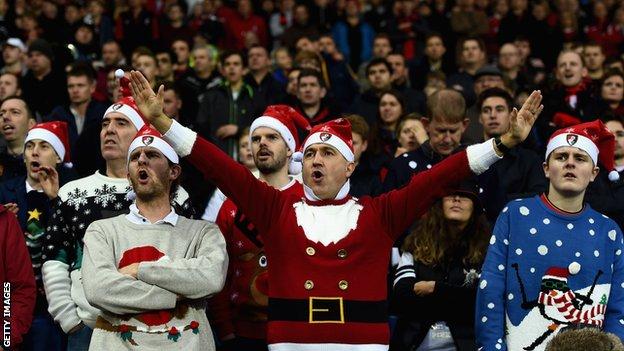 Football fans in festive wear