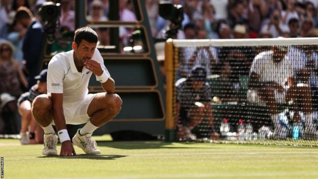 Novak Djokovic eats grass after his Wimbledon triumph in 2022